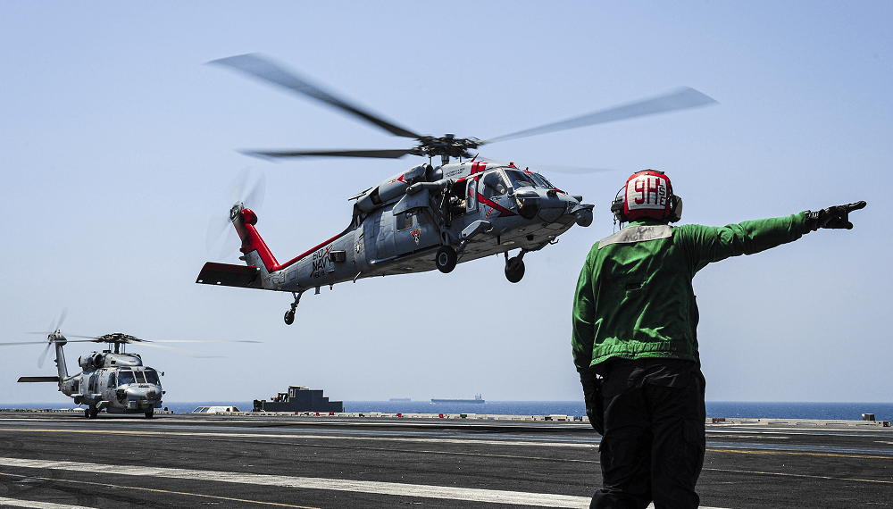 MH-60S Sea Hawk takes off from a flight deck
