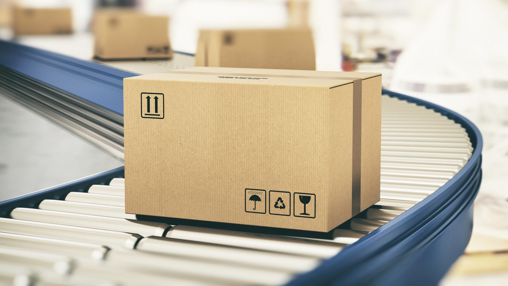 Boxes on a conveyor belt in a warehouse 