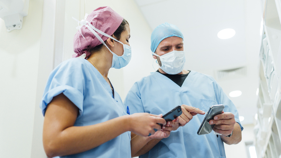 Nurses using mobile devices 