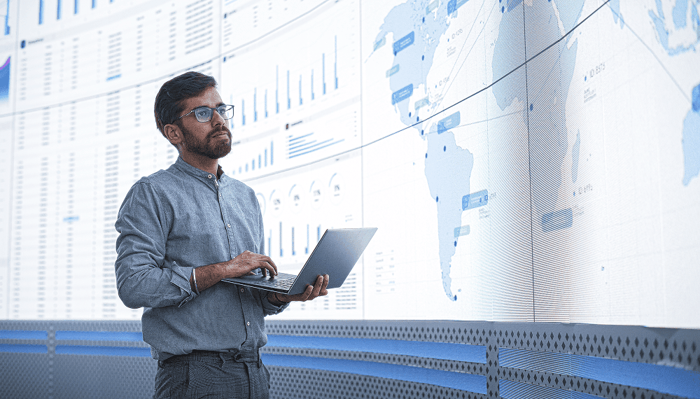 Logistics Expert Holding Laptop Computer